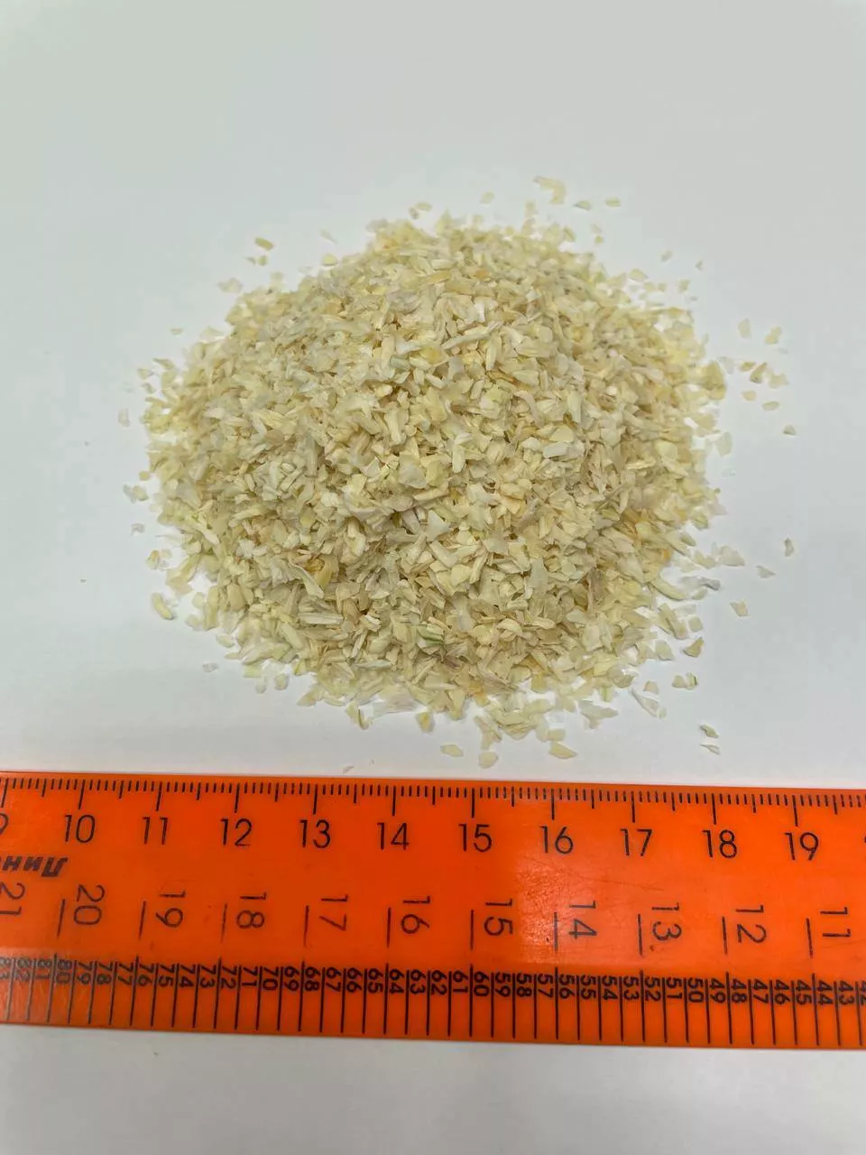 фотография продукта Лук белый сушеный гранулы 1-3мм